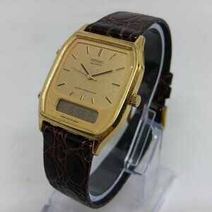 Seiko H449-5130 Men's 29mm x 31 mm Dual Display Ana-Digi Goldtone Watch PLS READ